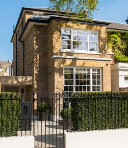 The exterior of 54 Bedford Gardens, Notting Hill, London. Architect: Nash Baker Interior Designer: Desalles Flint Architectural metalworks and PVD coated coloured stainless steel, Double Stone Steel Europe Ltd. - Photography by Toby Webb