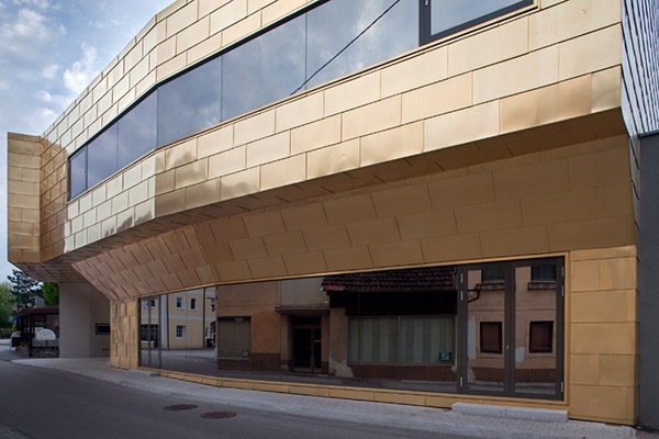 Community Centre façade in Tecu Gold, Wallern, Austria, 2009 by architects Schneider & Lengauer. - Photography by Kurt Hoerbst