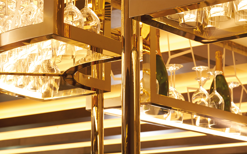 Brass Mirror finish PVD coloured stainless steel bar and restaurant fittings for The Devonshire Club Hotel, Mayfair, London, UK