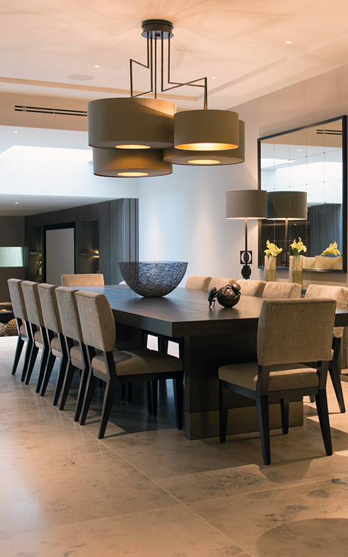 Dining/wine-tasting area. Bedford Gardens, London. Architects: Nash Baker Interior Designers: DeSalles Flint Architectural metalwork & PVD stainless steel: Double Stone Steel Europe Ltd