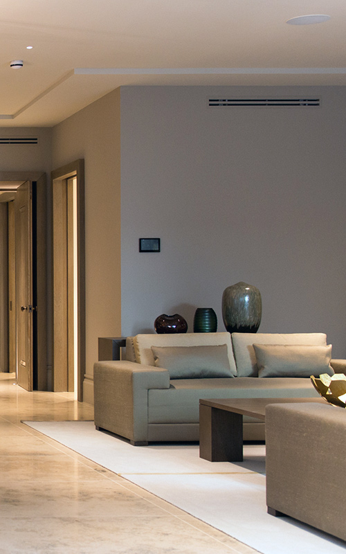 Relaxed sitting area. Bedford Gardens, London. Architects: Nash Baker Interior Designers: DeSalles Flint Architectural metalwork & PVD stainless steel: Double Stone Steel Europe Ltd