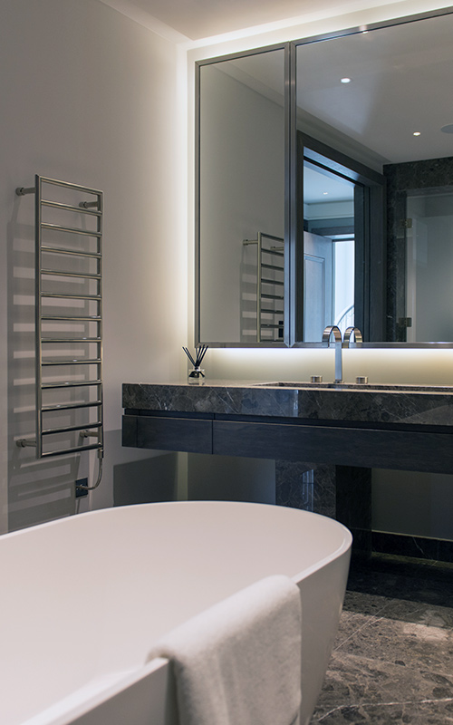 Marble and bronze PVD stainless steel bathroom fixtures, Bathroom, Bedford Gardens, London. Architects: Nash Baker Interior Designers: DeSalles Flint Architectural metalwork & PVD stainless steel: Double Stone Steel Europe Ltd