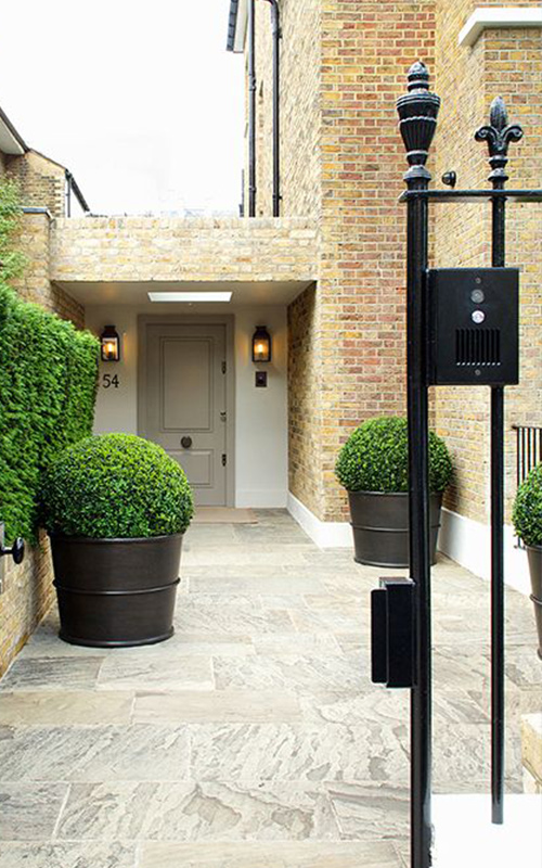 Entrance with patinated brass planters and railings. - Bedford Gardens, London. - Architects: Nash Baker - Interior Designers: DeSalles Flint - Architectural metalwork & specialist metal finishes: Double Stone Steel Europe Ltd