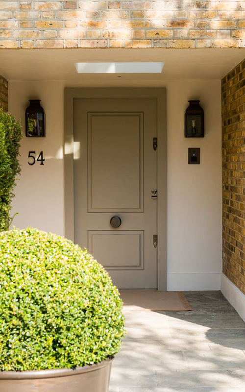 Entrance with patinated brass planters and railings. - Bedford Gardens, London. - Architects: Nash Baker - Interior Designers: DeSalles Flint - Architectural metalwork & specialist metal finishes: Double Stone Steel Europe Ltd