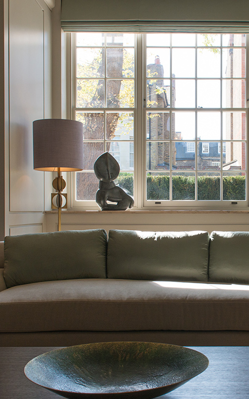 Ground floor formal sitting room looking towards front garden. Bedford Gardens, London. Architects: Nash Baker Interior Designers: DeSalles Flint Architectural metalwork & PVD stainless steel: Double Stone Steel Europe Ltd - Photography by Toby Webb