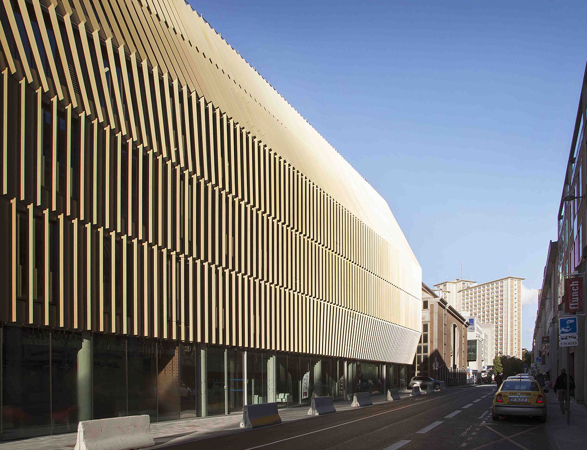 Showing the bronze aluminium blades forming the façade of The Conex Building, Lille by architects By Chartier-Corbosson and VS-A