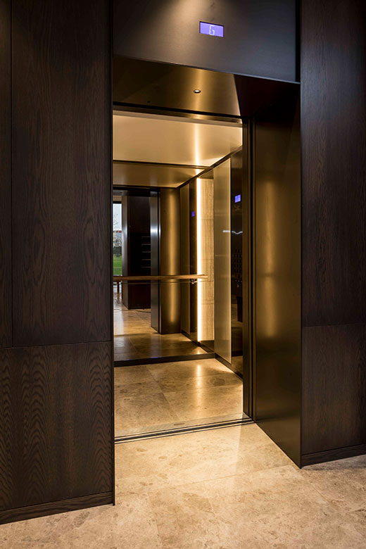 Architrave and panels in for elevator and lobby in V-Grooved PVD coloured stainless steel in Chocolate Vibration. - Fenman House, Apartment Building, 9 Handyside St, King’s Cross, London N1C. - Fabrication, V-Grooving and folding of PVD coloured stainless steel by Double Stone Steel Europe Ltd. Architrave and panels in for elevator and lobby in V-Grooved PVD coloured stainless steel in Chocolate Vibration. - Fenman House, Apartment Building, 9 Handyside St, King’s Cross, London N1C. - Fabrication, V-Grooving and folding of PVD coloured stainless steel by Double Stone Steel Europe Ltd.