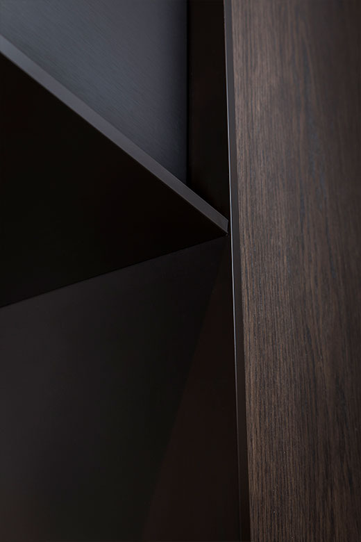 Showing detail of elevator architrave and panels in PVD coloured stainless steel in Chocolate Vibration. - Fenman House, Apartment Building, 9 Handyside St, King’s Cross, London N1C. - V-Grooving and folding by Double Stone Steel Europe Ltd Showing detail of elevator architrave and panels in PVD coloured stainless steel in Chocolate Vibration. - Fenman House, Apartment Building, 9 Handyside St, King’s Cross, London N1C. - V-Grooving and folding by Double Stone Steel Europe Ltd
