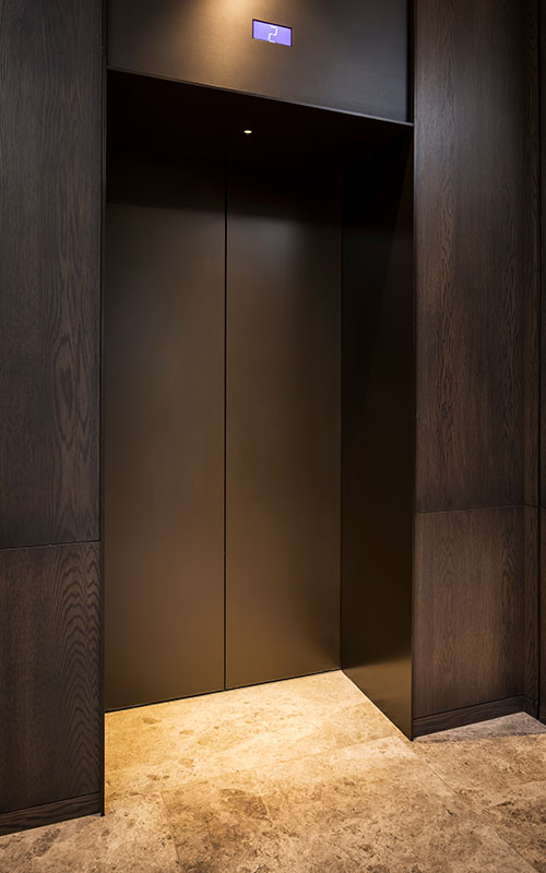 V-Grooved architrave in the elevator lobby allows for sharp folds. - Elevator architrave and panels in V-Grooved PVD coloured stainless steel in Chocolate Vibration. Fenman House, Apartment Building, 9 Handyside St, King’s Cross, London N1C. - Fabrication, V-Grooving and folding of stainless steel by Double Stone Steel Europe Ltd. V-Grooved architrave in the elevator lobby allows for sharp folds. - Elevator architrave and panels in V-Grooved PVD coloured stainless steel in Chocolate Vibration. Fenman House, Apartment Building, 9 Handyside St, King’s Cross, London N1C. - Fabrication, V-Grooving and folding of stainless steel by Double Stone Steel Europe Ltd.