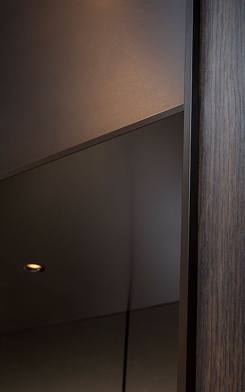 Vertical and horizontal trim in V-Grooved stainless steel with Bronze finish. - Elevator architrave and panels in V-Grooved PVD coloured stainless steel in Chocolate Vibration. Fenman House, Apartment Building, 9 Handyside St, King’s Cross, London N1C. - Fabrication, V-Grooving and folding of stainless steel by Double Stone Steel Europe Ltd. Vertical and horizontal trim in V-Grooved stainless steel with Bronze finish. - Elevator architrave and panels in V-Grooved PVD coloured stainless steel in Chocolate Vibration. Fenman House, Apartment Building, 9 Handyside St, King’s Cross, London N1C. - Fabrication, V-Grooving and folding of stainless steel by Double Stone Steel Europe Ltd.