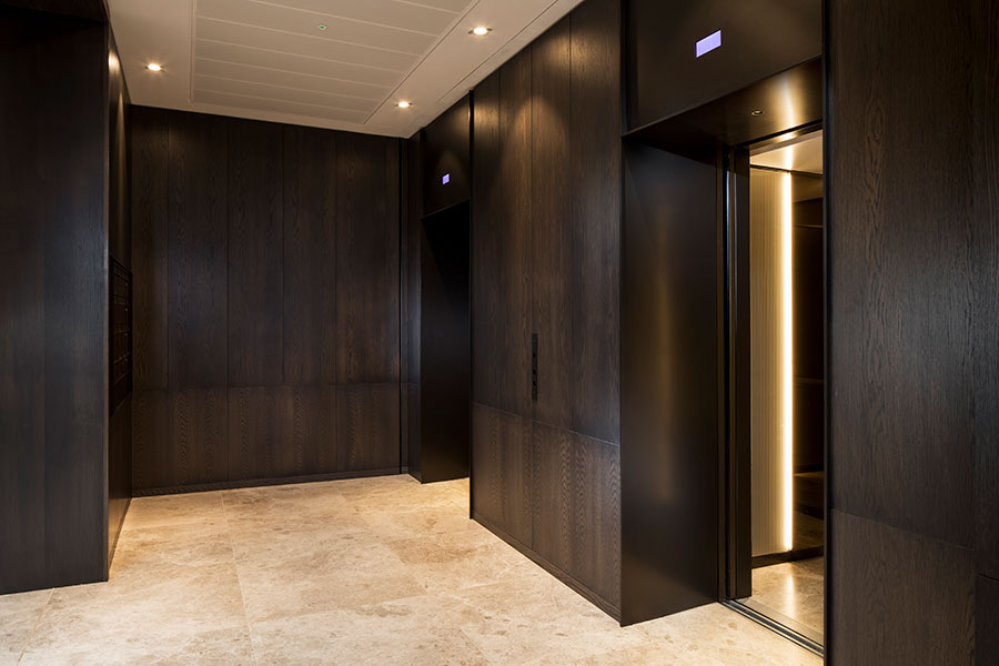 A streamlined, harmonious look is achieved using architrave and trim in Bronze finished stainless steel with Wenge cladding panels. - Elevator architrave and panels in V-Grooved PVD coloured stainless steel in Chocolate Vibration. Fenman House, Apartment Building, 9 Handyside St, King’s Cross, London N1C. - Fabrication, V-Grooving and folding of stainless steel by Double Stone Steel Europe Ltd. A streamlined, harmonious look is achieved using architrave and trim in Bronze finished stainless steel with Wenge cladding panels. - Elevator architrave and panels in V-Grooved PVD coloured stainless steel in Chocolate Vibration. Fenman House, Apartment Building, 9 Handyside St, King’s Cross, London N1C. - Fabrication, V-Grooving and folding of stainless steel by Double Stone Steel Europe Ltd.