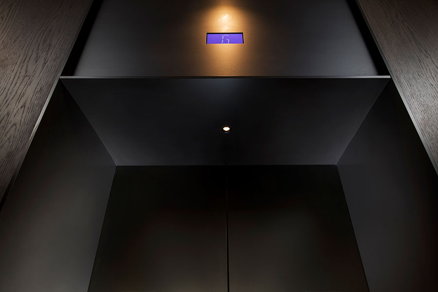 An upmarket, atmospheric look was achieved for the elevators and lobby through the use of toning Bronze finishes. - Elevator architrave and panels in V-Grooved PVD coloured stainless steel in Chocolate Vibration. Fenman House, Apartment Building, 9 Handyside St, King’s Cross, London N1C. - Fabrication, V-Grooving and folding of stainless steel by Double Stone Steel Europe Ltd. An upmarket, atmospheric look was achieved for the elevators and lobby through the use of toning Bronze finishes. - Elevator architrave and panels in V-Grooved PVD coloured stainless steel in Chocolate Vibration. Fenman House, Apartment Building, 9 Handyside St, King’s Cross, London N1C. - Fabrication, V-Grooving and folding of stainless steel by Double Stone Steel Europe Ltd.