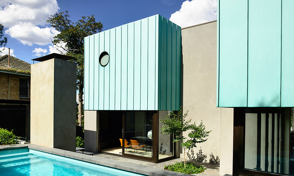 Pre-aged copper cladding panels create a green façade for Eaglemont House by Kennedy Nolan Architects. Photography by Derek Swalwell