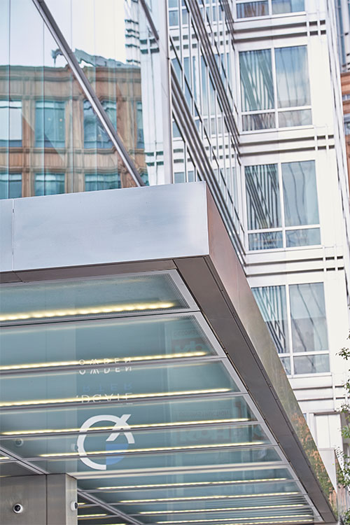 Frameless Glazed Satin Stainless Steel Canopy. 1 Broadgate Quarter, Snowden St, London, EC2A 2AW - Architects: John Robertson Architects. - Stainless Steel Canopy: Double Stone Steel Europe Ltd. - The upgraded building design has now harmonised the building with its surroundings. Frameless Glazed Satin Stainless Steel Canopy. 1 Broadgate Quarter, Snowden St, London, EC2A 2AW - Architects: John Robertson Architects. - Stainless Steel Canopy: Double Stone Steel Europe Ltd. - The upgraded building design has now harmonised the building with its surroundings.