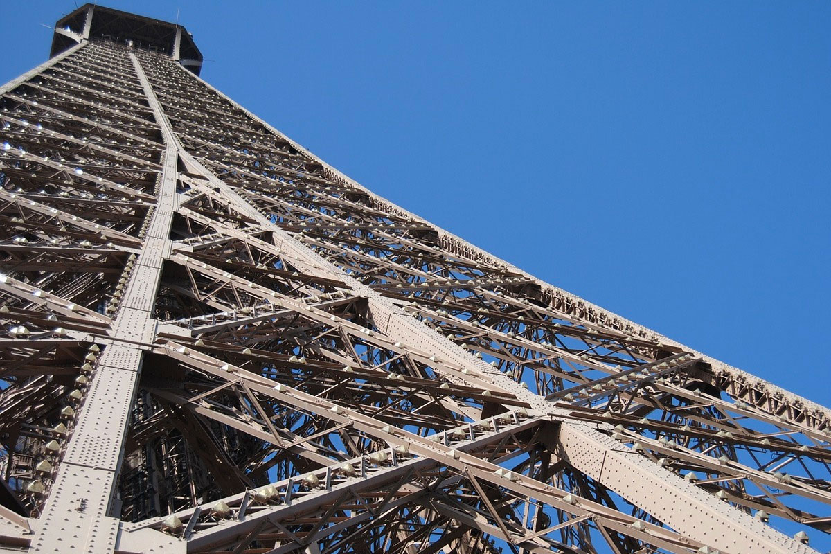 The Eiffel Tower in Paris, designed by Gustave Eiffel and completed in 1889. It was constructed from wrought-iron girders and marked the entrance to the World Fair.