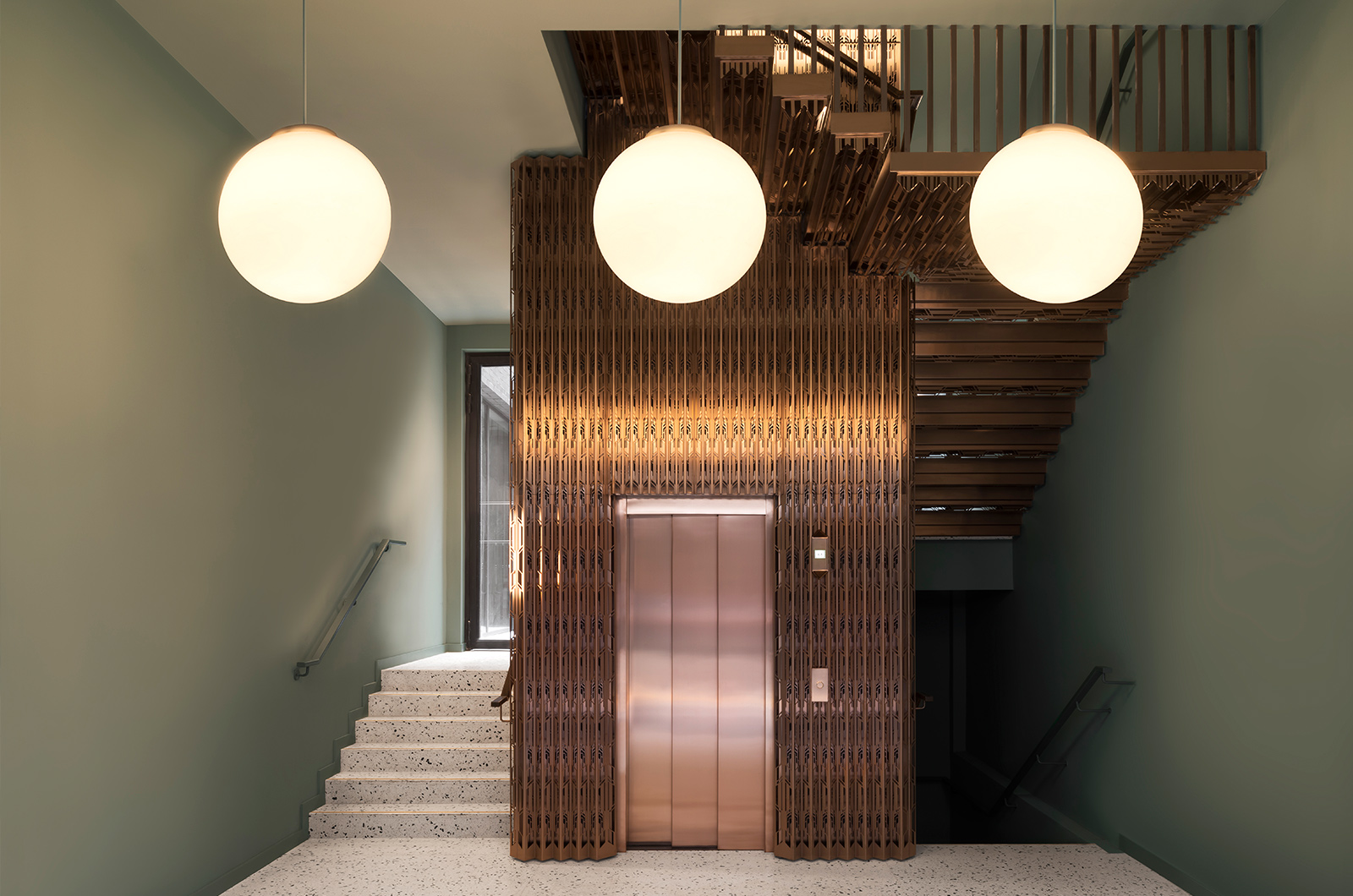 The Gaslight Building, 29 – 35 Rathbone Street, London. - Developer I.S.A Holdings - Interior architecture and design: bureau de change design office Architects: dMFK Architects - Laser-cut PVD coloured stainless steel in custom Bronze Hairline for stairs, lift core and architectural detailing by Double Stone Steel in partnership with Double Stone Steel Europe Ltd. - Photography by GilbertMcCarragher The Gaslight Building, 29 – 35 Rathbone Street, London. - Developer I.S.A Holdings - Interior architecture and design: bureau de change design office Architects: dMFK Architects - Laser-cut PVD coloured stainless steel in custom Bronze Hairline for stairs, lift core and architectural detailing by Double Stone Steel in partnership with Double Stone Steel Europe Ltd. - Photography by GilbertMcCarragher
